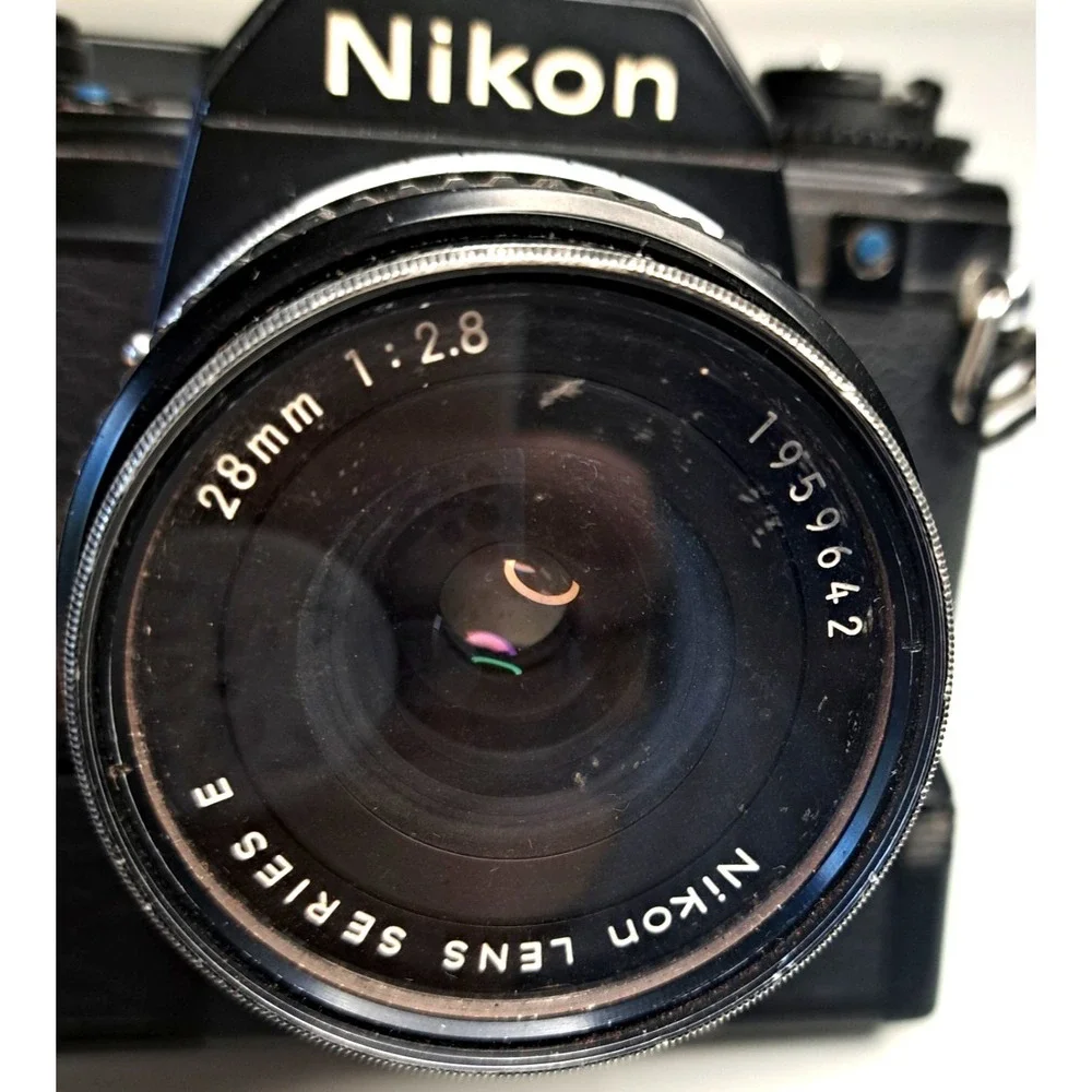 Vintage Nikon EM Black SLR Film Camera + Nikon Lens + Flash + Film + Manuals